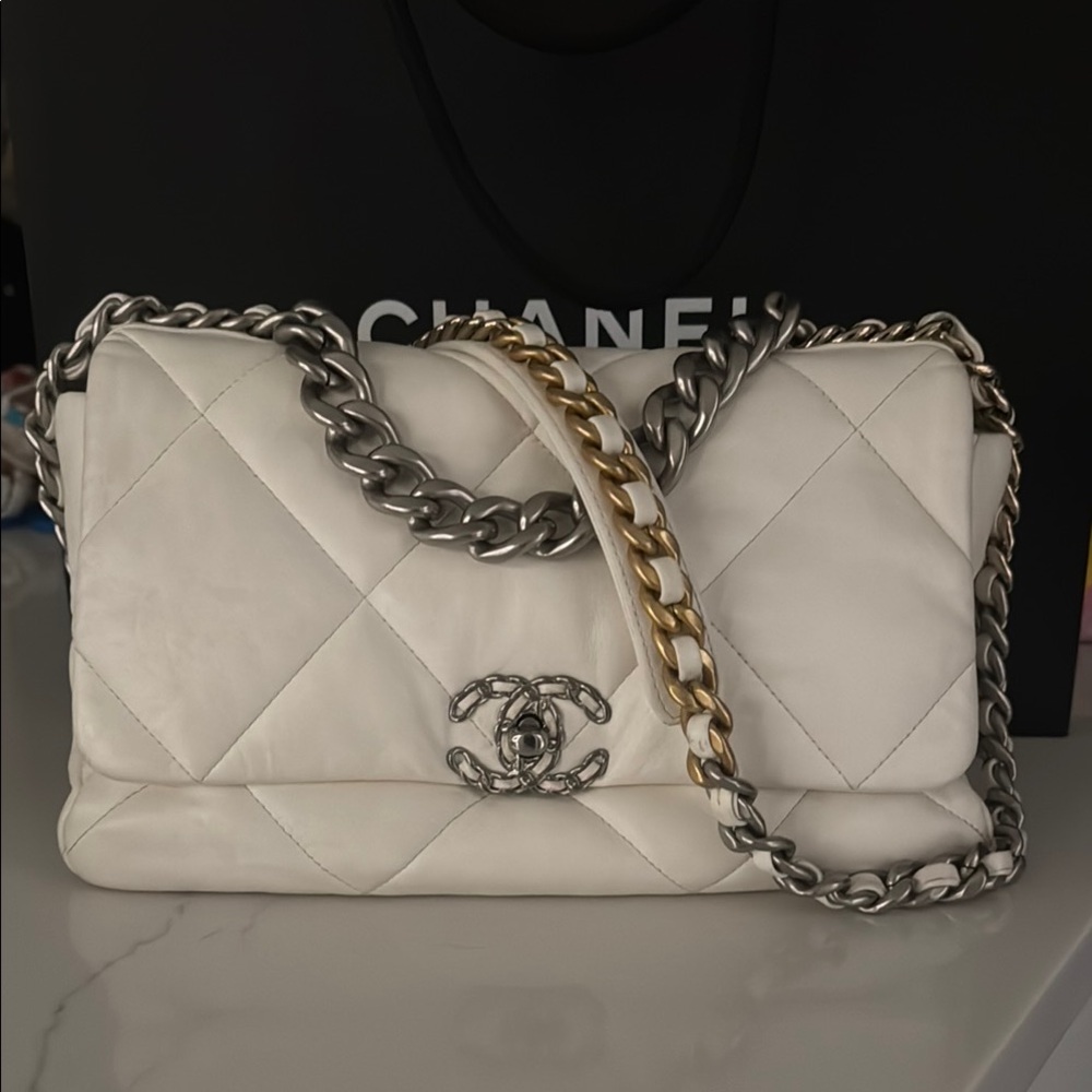 CHANEL 19 White, silver, and gold Quilted Shoulder Bag with Flap Closure